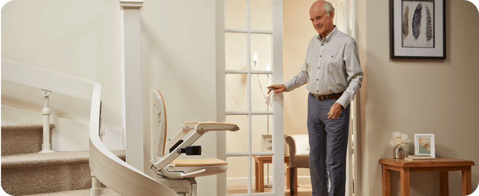 senior with stairlift